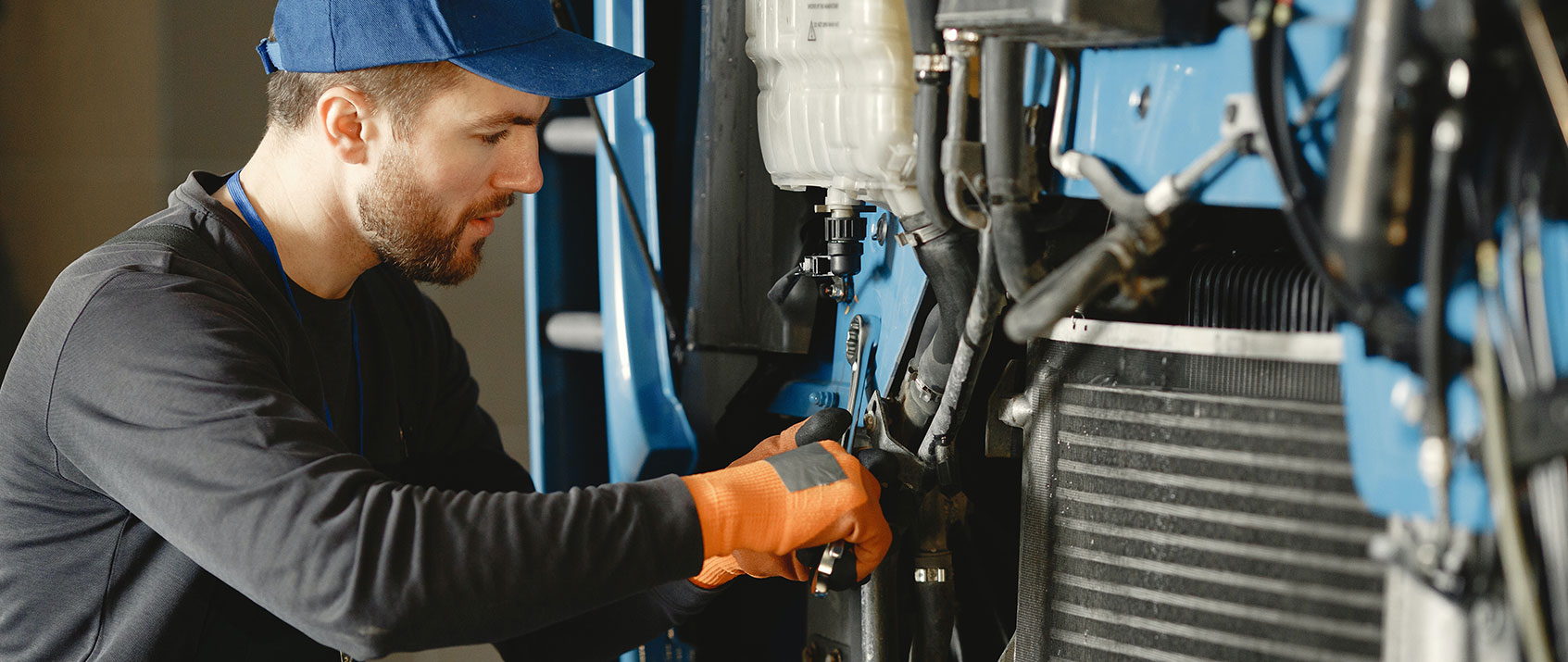 Mechanic Working on Truck Mechanic Working on Truck